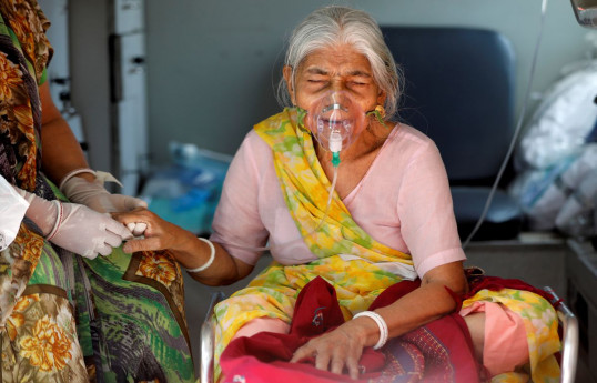 Indian data suggests runaway COVID infections as deaths hit daily record