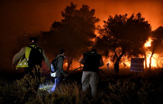 Greece evacuates villages as forest fire rages in Corinth region