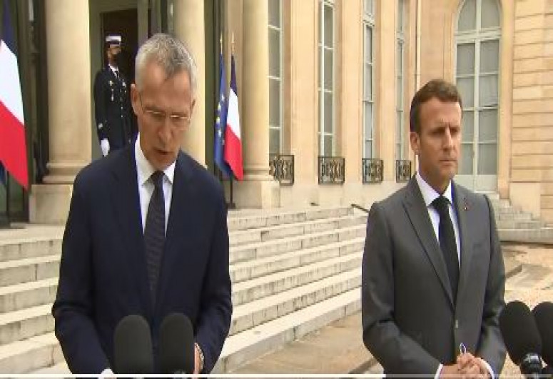 UN Secretary-General Jens Stoltenberg and French President Emmanuel Macron