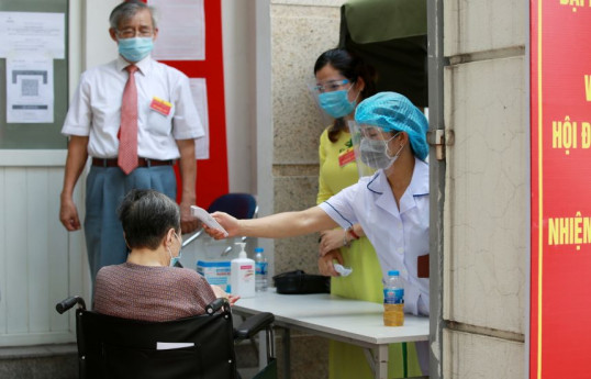 Vietnam expands lockdown curbs to contain Covid outbreak