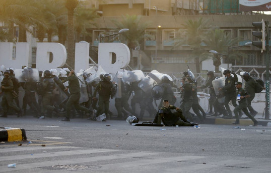 One protester dies after clashes with police in Baghdad - sources