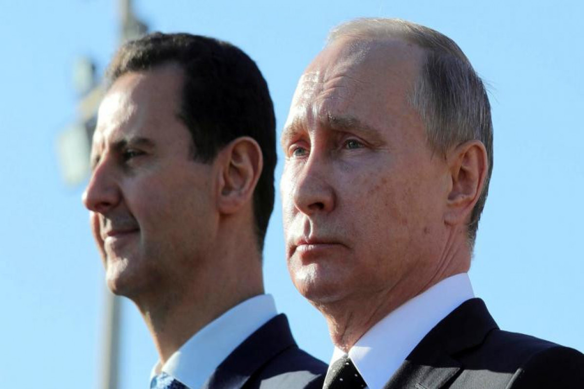 Bashar al-Assad and Vladimir Putin