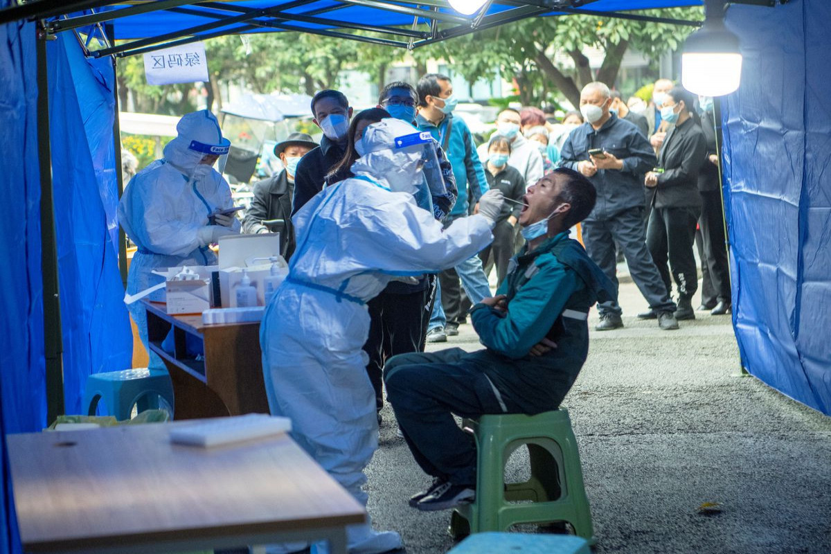 Chinese city says it mass tested 30,000 for COVID-19 at mega centre, rounded-up runaways