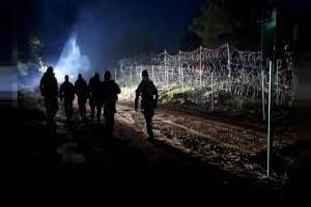Neighbours of Belarus say migrant crisis risks military clash