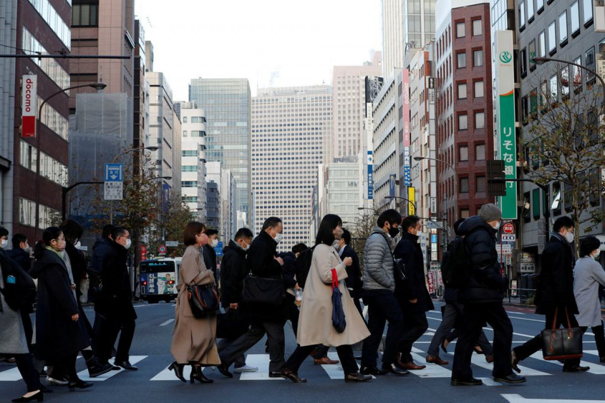 Japan's economy shrinks more than expected as supply shortages hit
