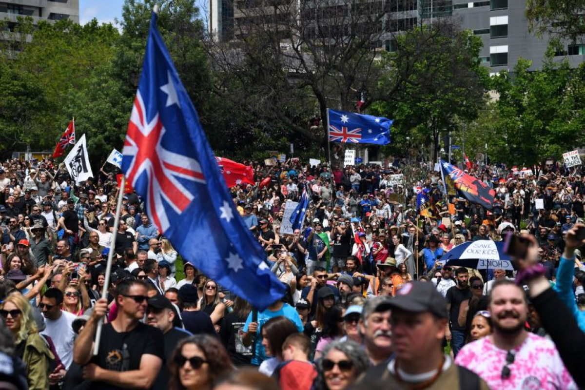 Pro and anti-vaccination protesters take to Australia streets