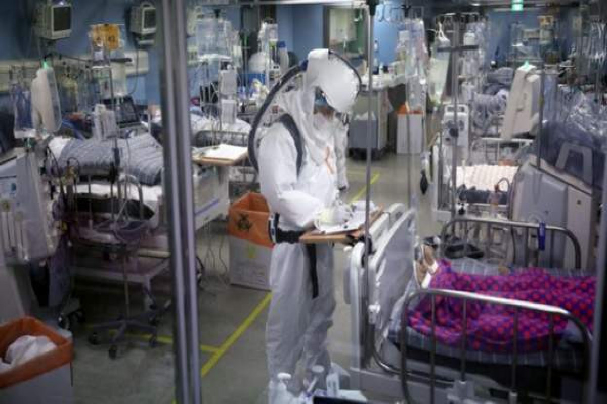 South Korea's hospitals under pressure as cases surge