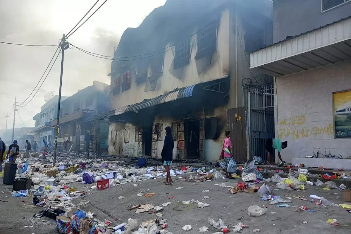 Over 100 people arrested in Solomon Islands after riots in Honiara