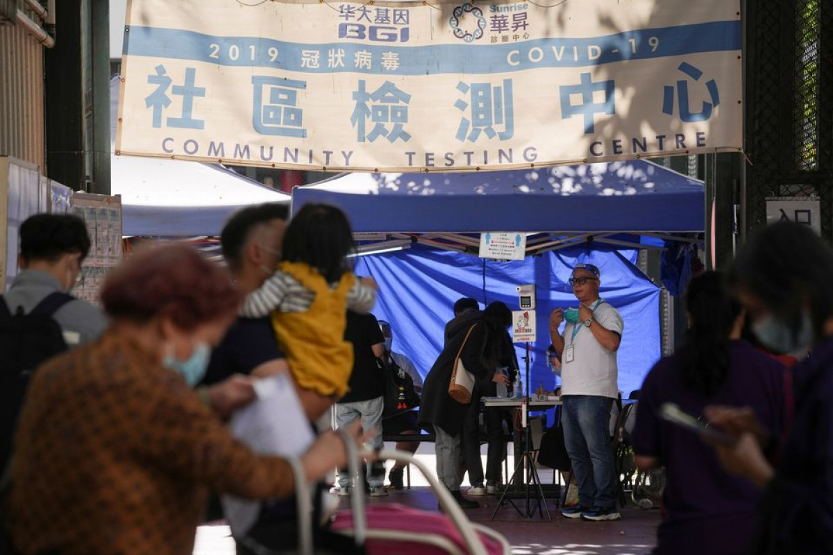 Omicron fears prompt Hong Kong to expand travel curbs; Australia reports 5 cases