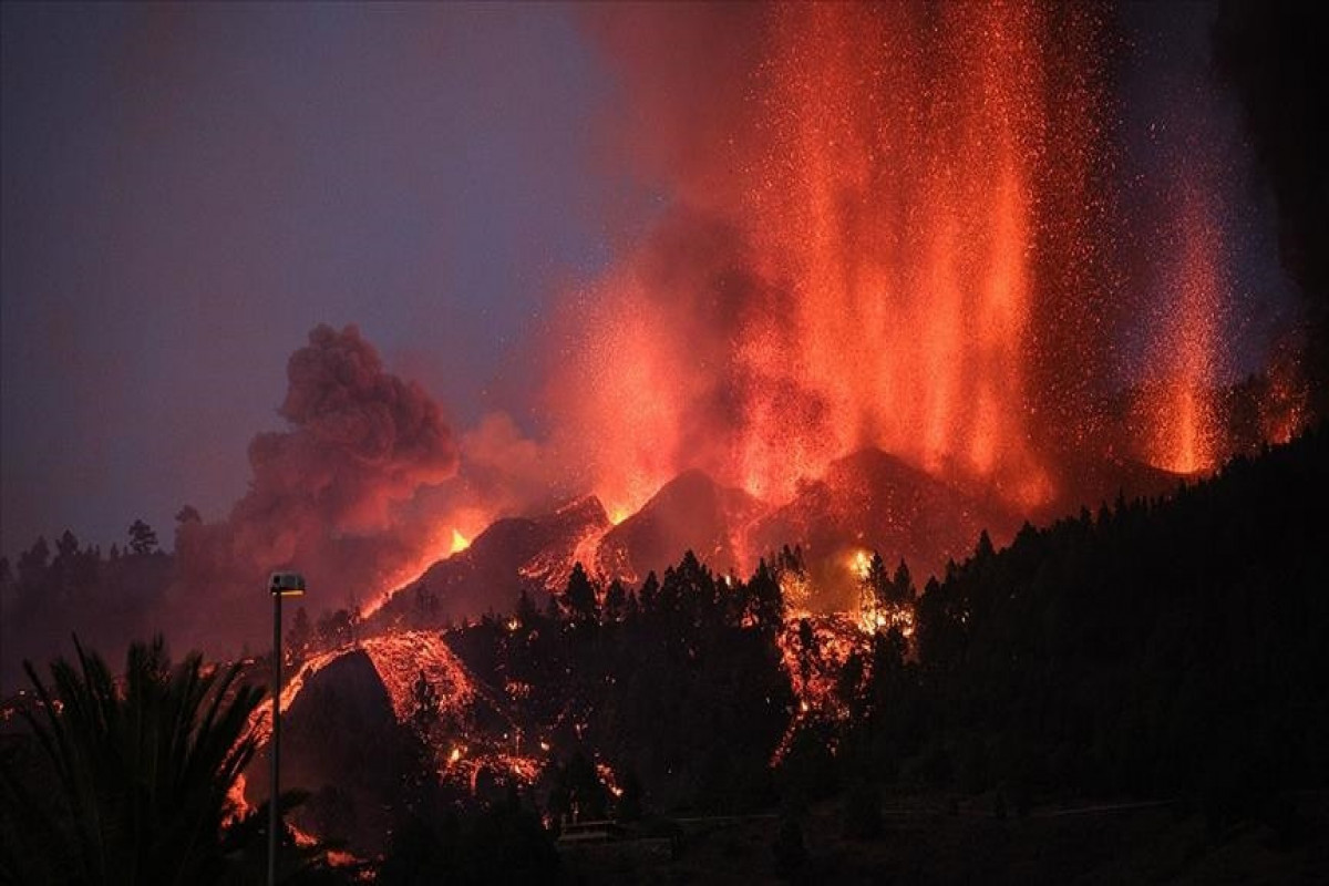 Spain pledges $239M to help volcano-hit island