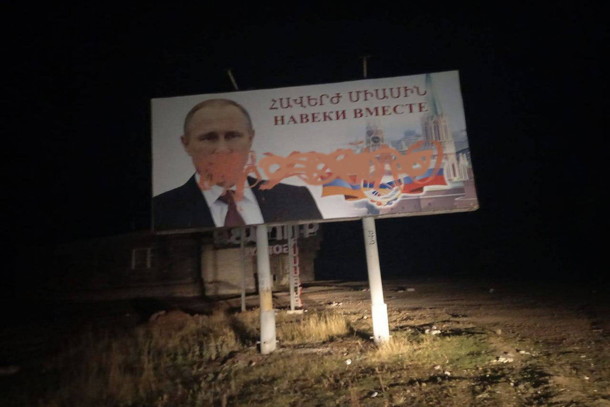 Armenian vandals insult billboard with Putin's picture