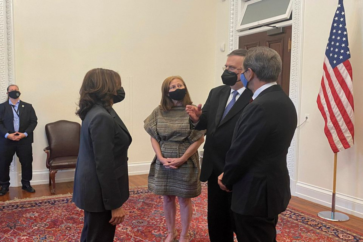 Mexican Foreign Minister Marcelo Ebrard chats with U.S. Vice President Kamala Harris, U.S. Secretary of State Anthony Blinken and Mexican Economy Minister Tatiana Clouthier