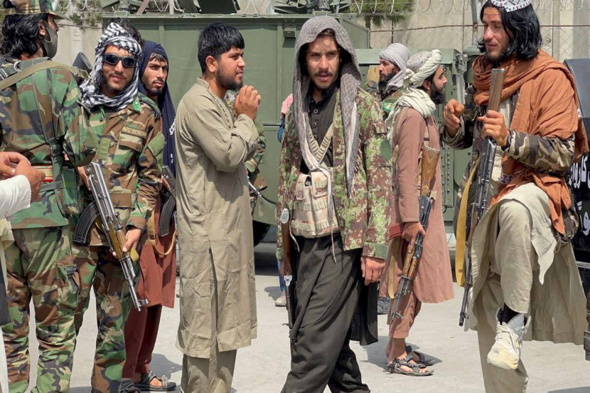 Taliban forces patrol at a runway a day after U.S troops withdrawal from Hamid Karzai International Airport in Kabul, Afghanistan August 31, 2021.