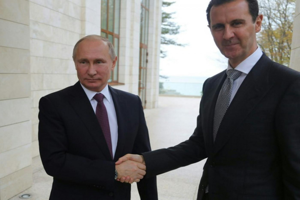 Russian President Vladimir Putin and Syrian President Bashar Assad