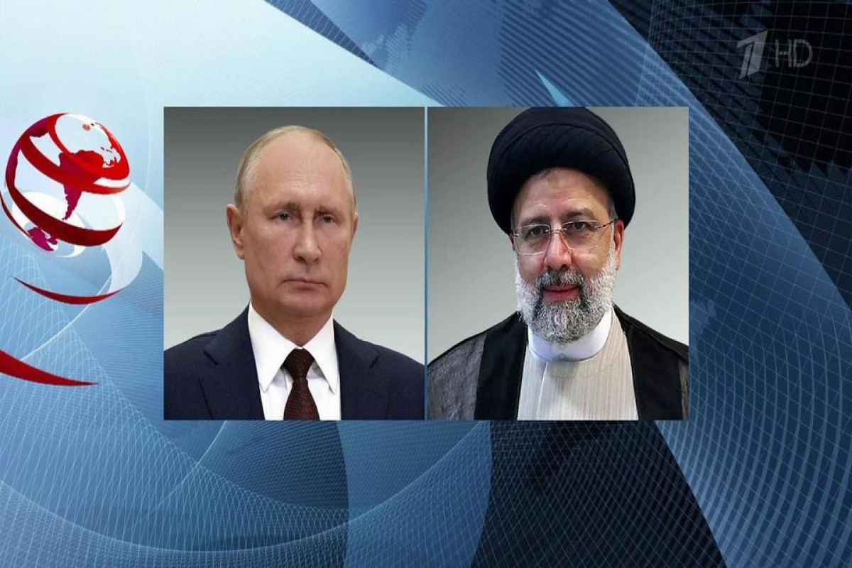 Vladimir Putin and  Ebrahim Raeisi