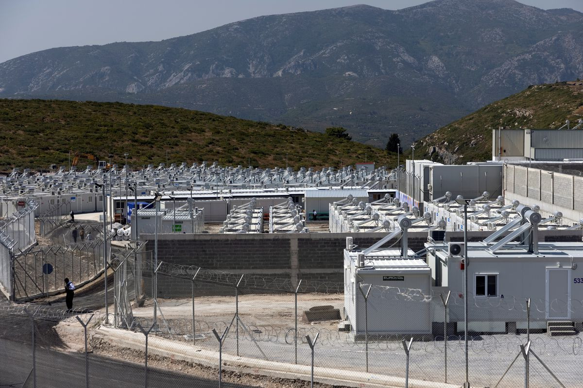 Greece opens new migrant holding camp on island amid tougher policy