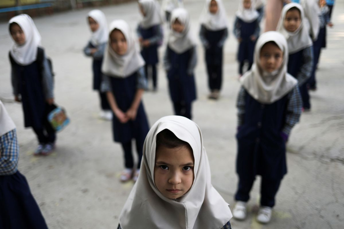 Some Afghan girls return to school, others face anxious wait