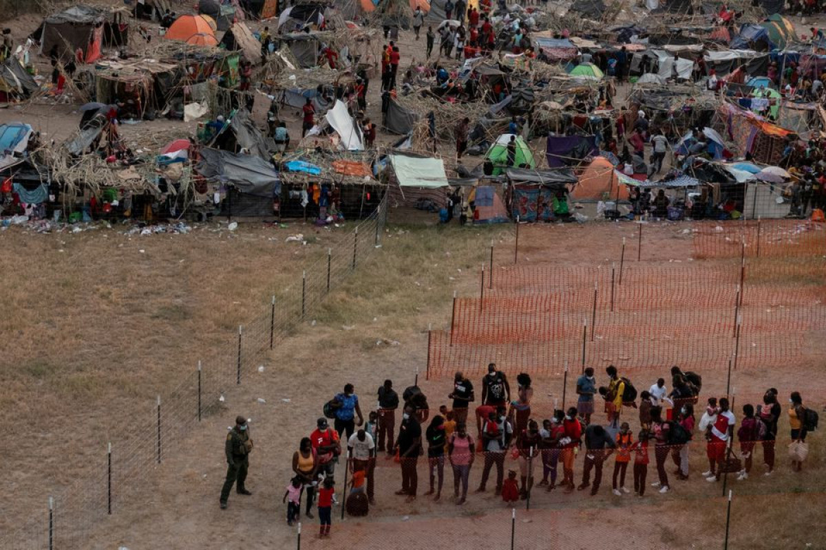 U.S. and Mexico fly Haitian migrants away from border as pressure builds on Biden