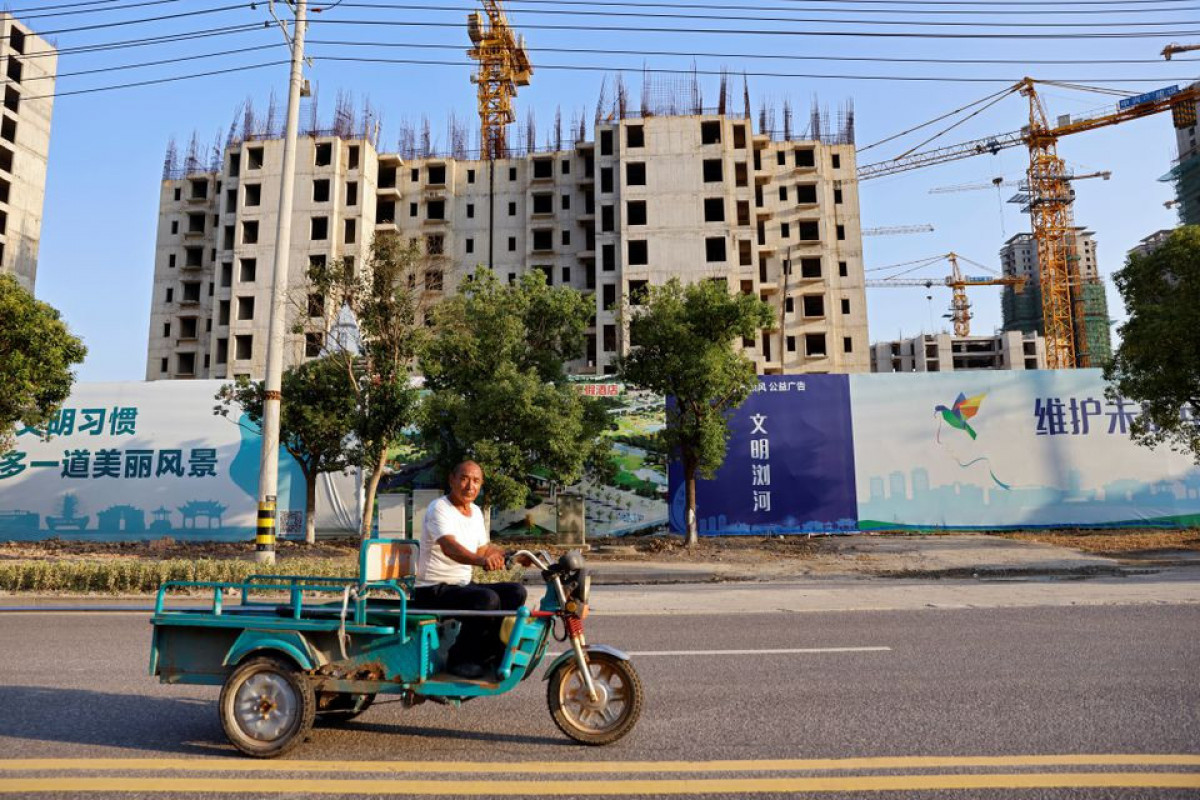 Evergrande debt crisis ensnares retail investors, builders and homebuyers