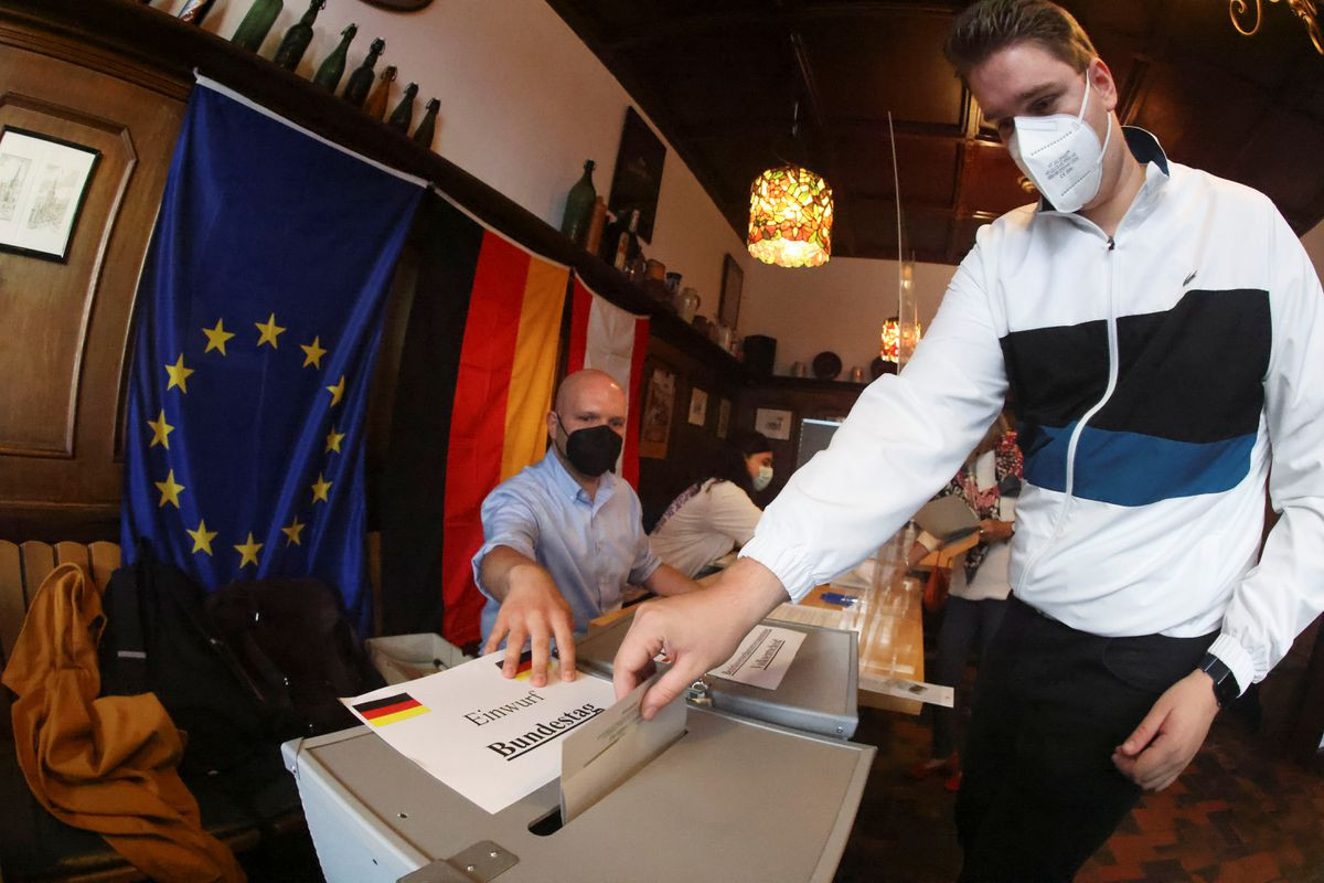 German Social Democrats beat conservatives in vote to decide Merkel successor