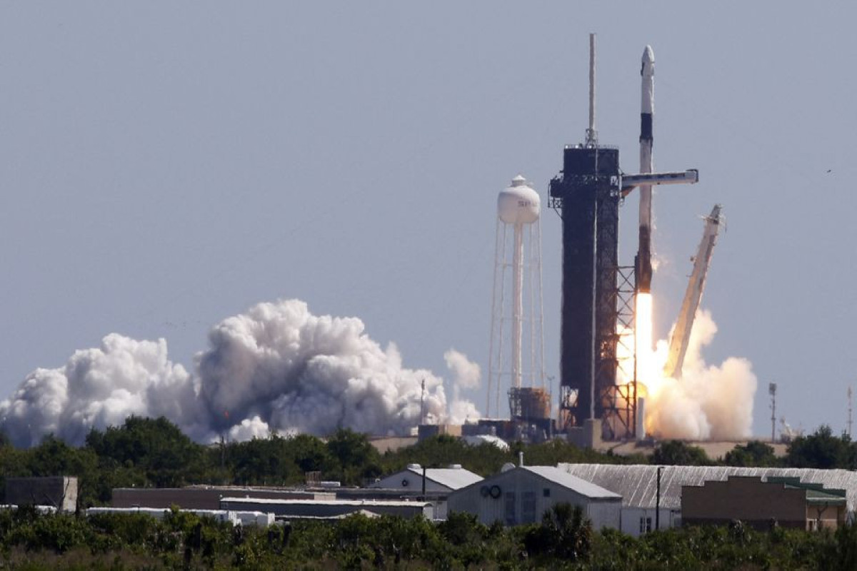 Space station's first all-private astronaut team docked to orbiting platform