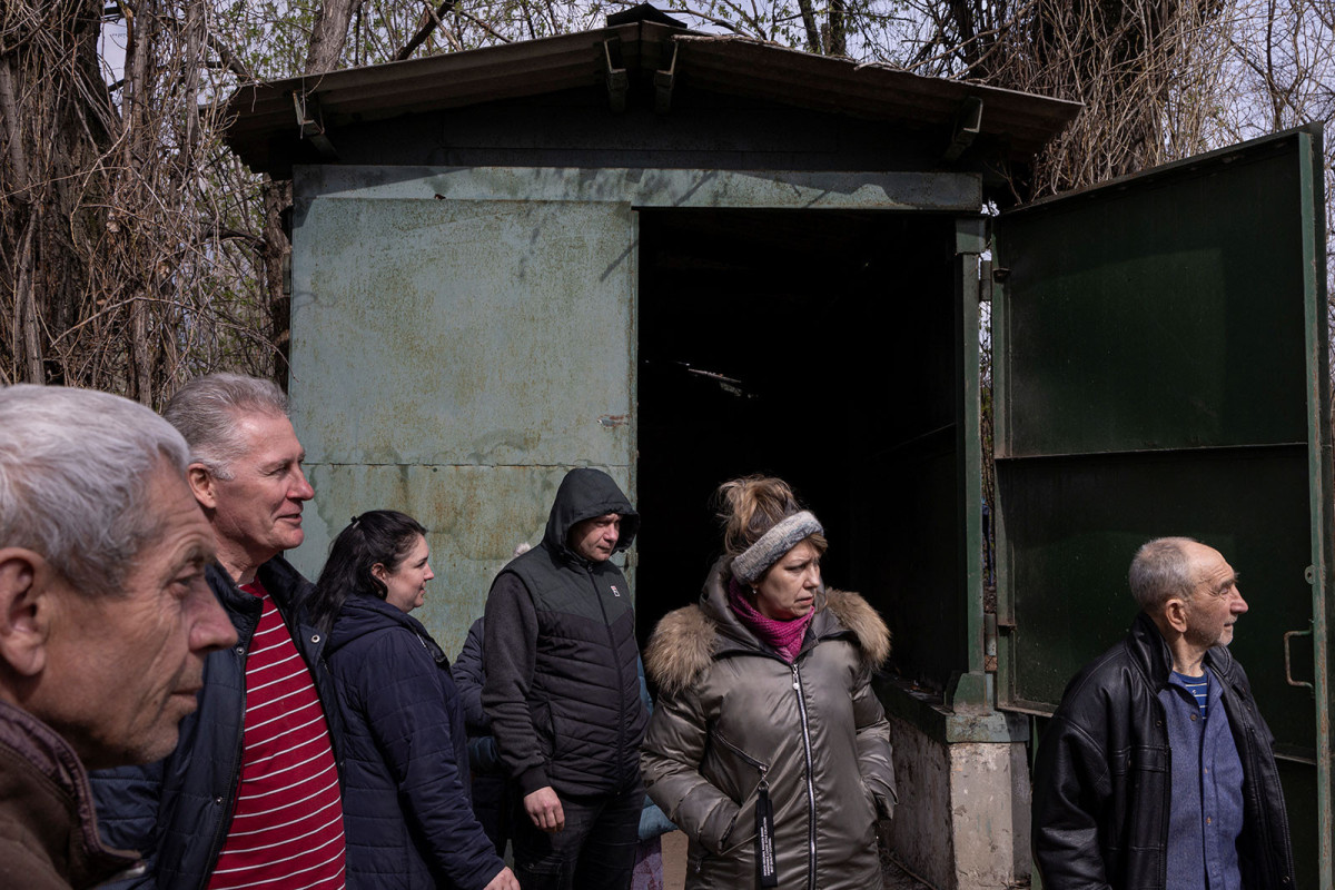 Bodies in Bucha mass grave are being exhumed to recover and identify the dead