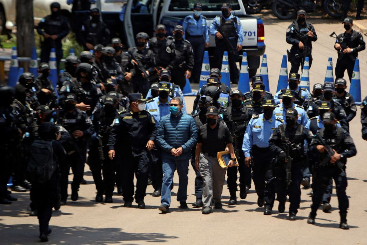U.S. charges ex-Honduras president Hernandez with drugs, weapons crimes