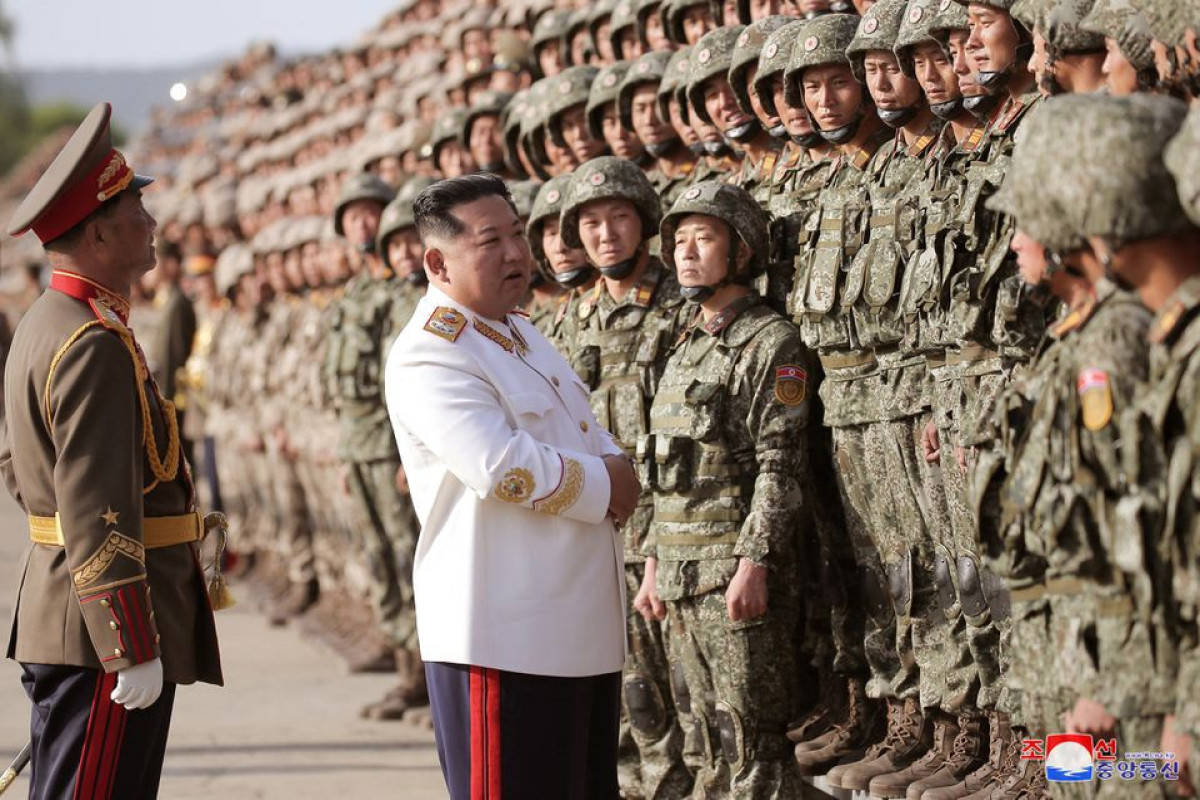 N.Korea's Kim calls for stronger military as nuclear test work 'well underway'