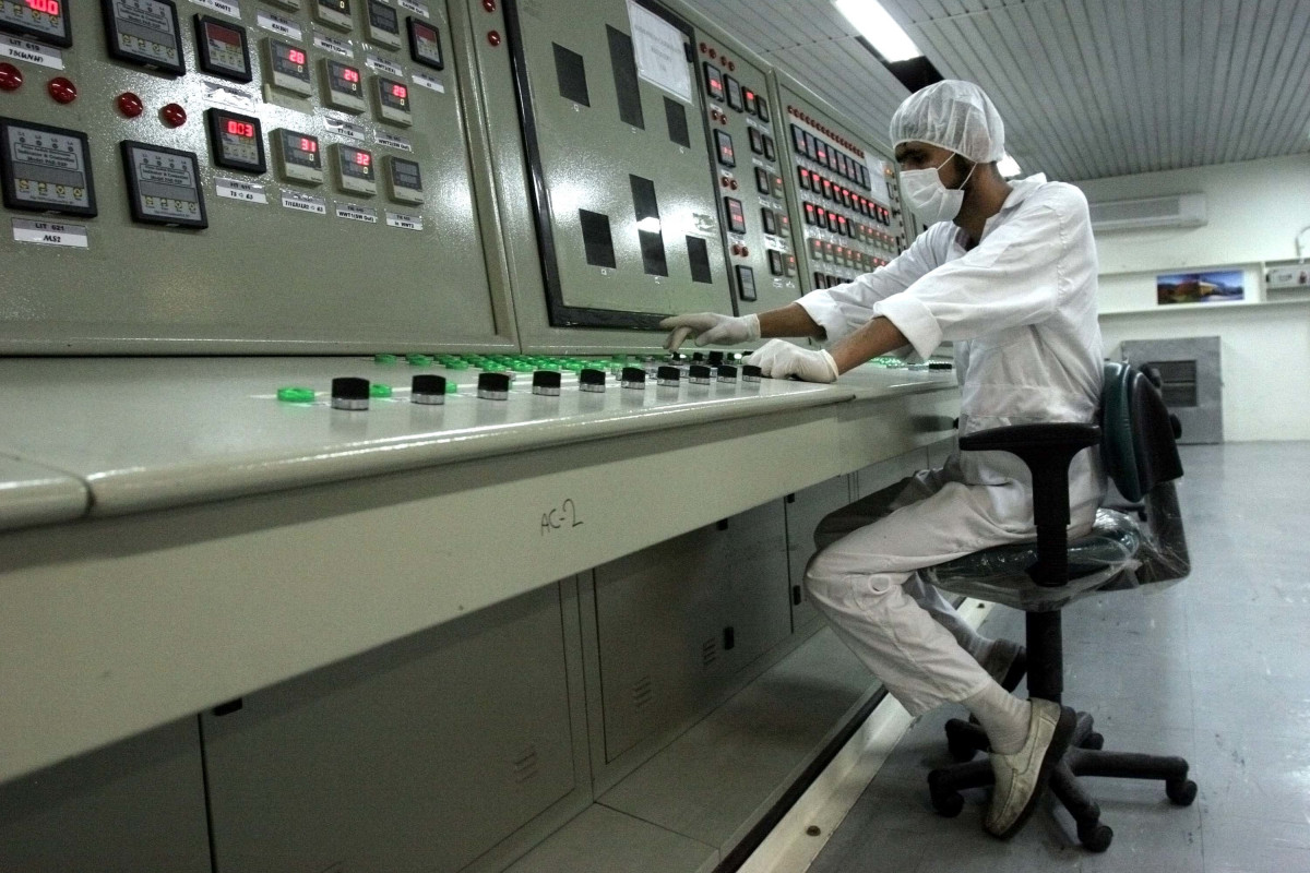 Iran says to begin gas injection into new centrifuges