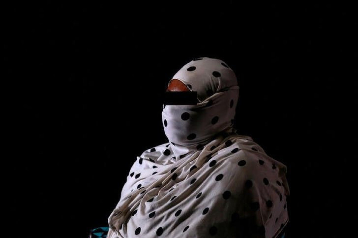 A Nigerian woman, unnamed to protect her identity
