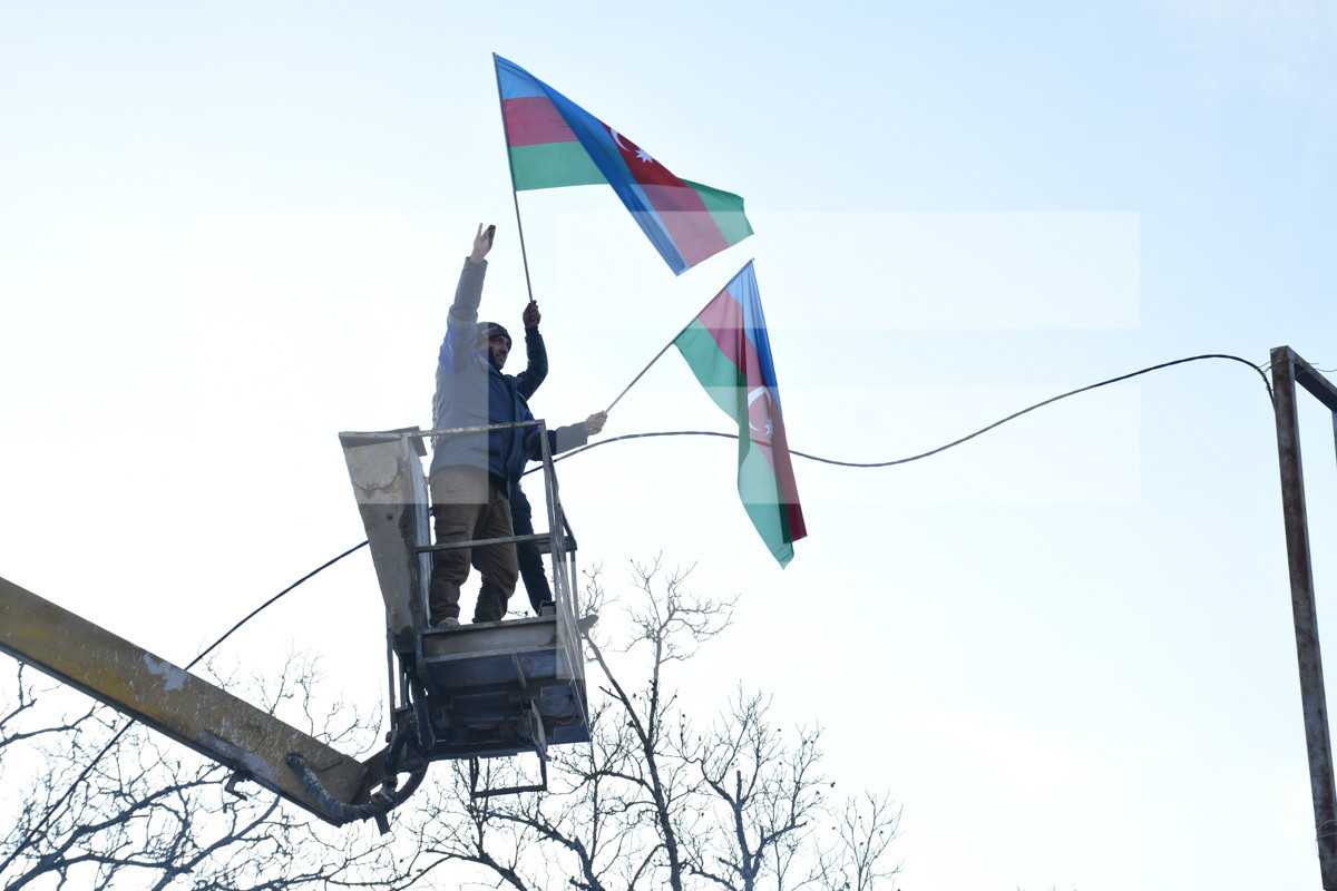 Eco-activists holding an action on Lachin road preparing for the night, power line installed and Azerbaijani flag hung on the road-PHOTO -VIDEO 