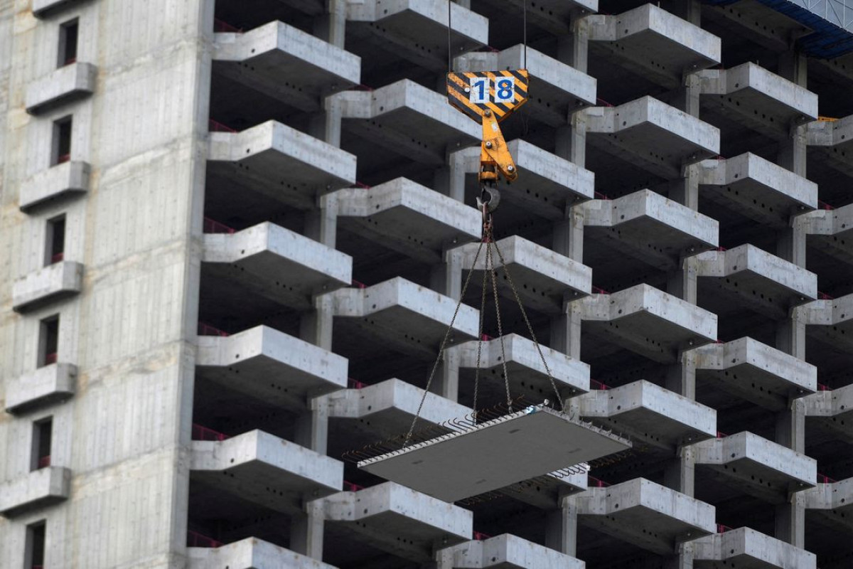 China central banker calls for strengthening property sector policies