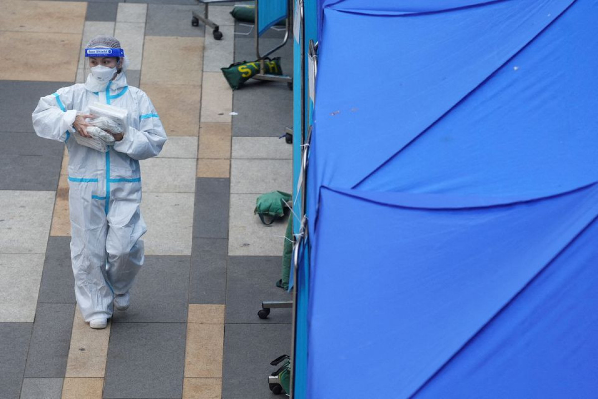 Hong Kong leader says fifth COVID wave has 'overwhelmed' city's capacity