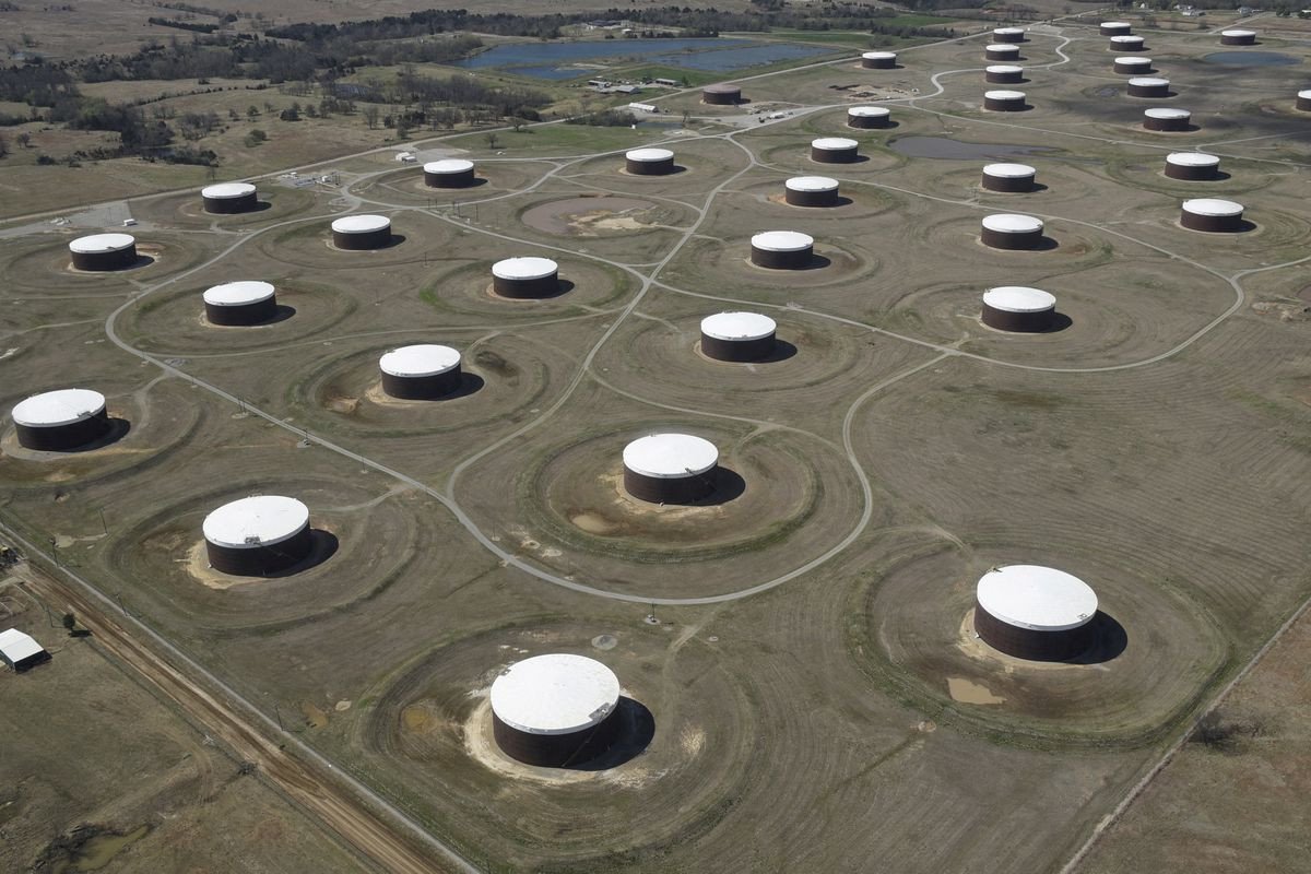 Oil headed for weekly fall, prospect of Iran deal stokes fears of extra supply