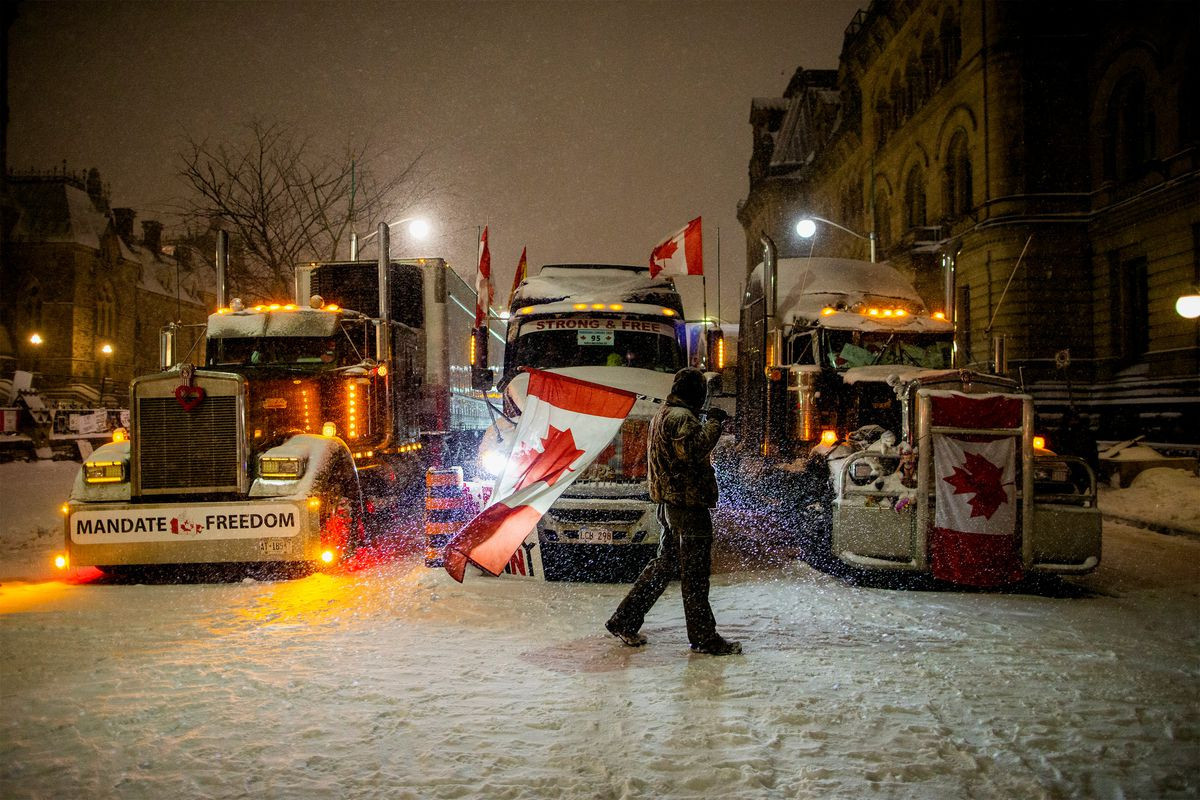 Canada police begin towing trucks to clear Ottawa protests