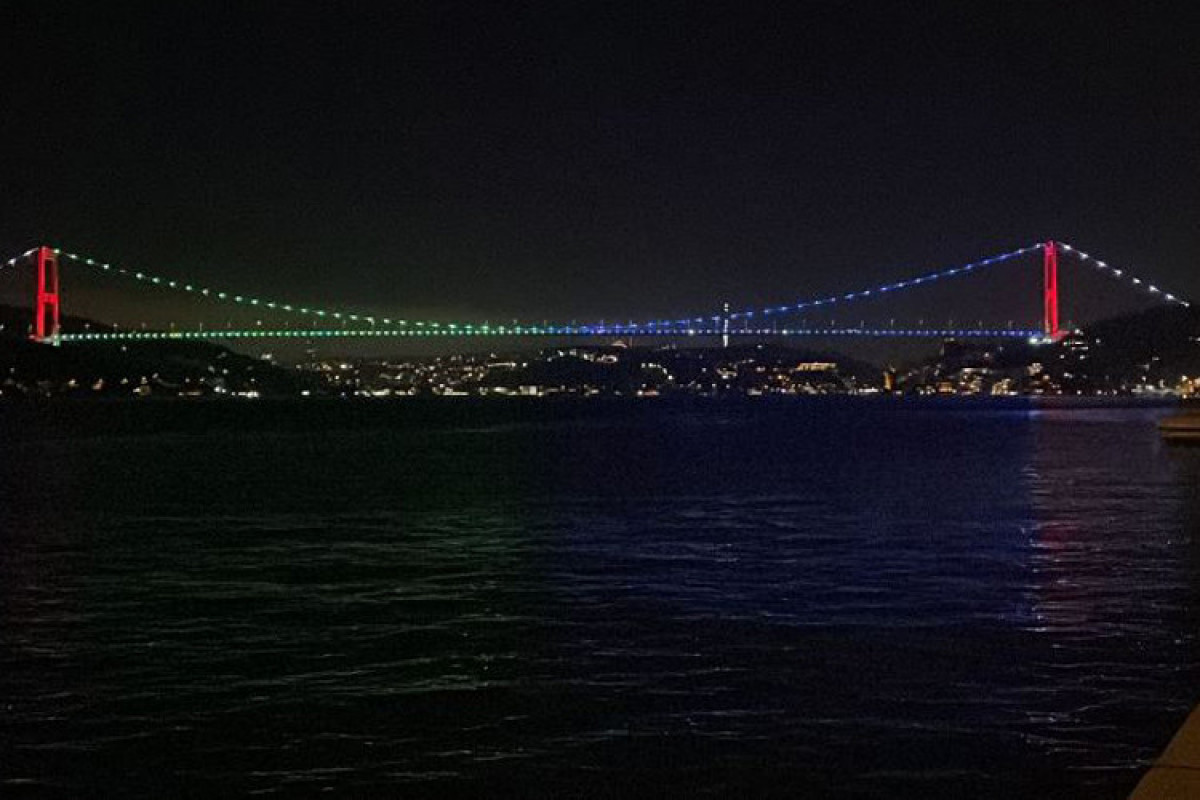 Istanbul's Fatih Sultan Mehmet Bridge is illuminated with the colors of the Azerbaijani flag