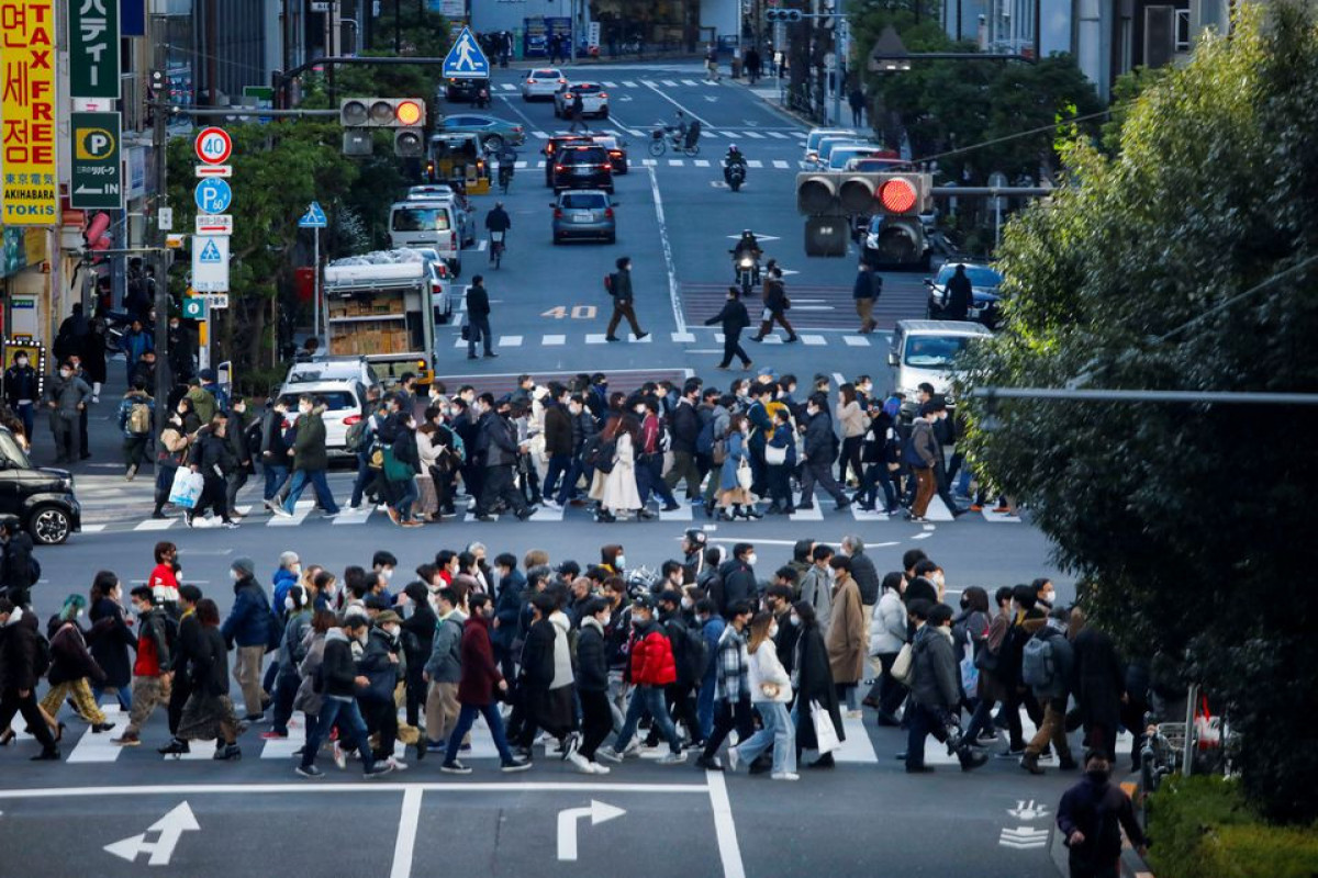 Japan poised to widen COVID-19 controls as Omicron drives record infections