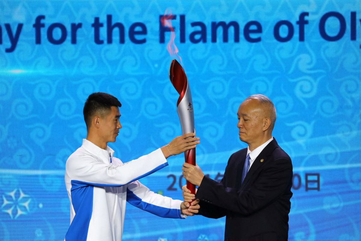 Olympics Beijing Games torch relay confined to closed venues due to COVID