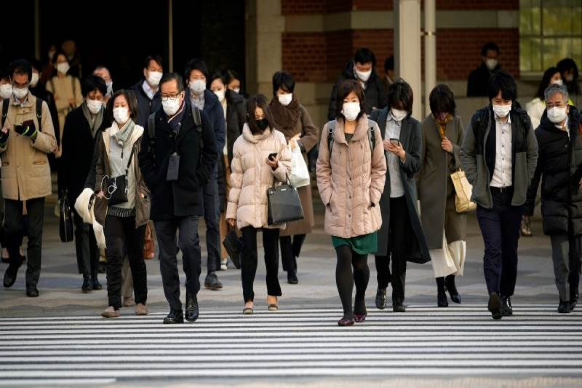 Japan sees record of 62,612 daily COVID cases
