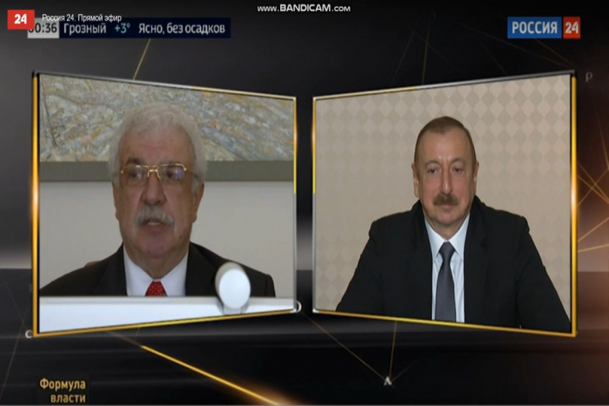 TASS First Deputy Director General Mikhail Gusman Mikhail and President of Azerbaijan Ilham Aliyev