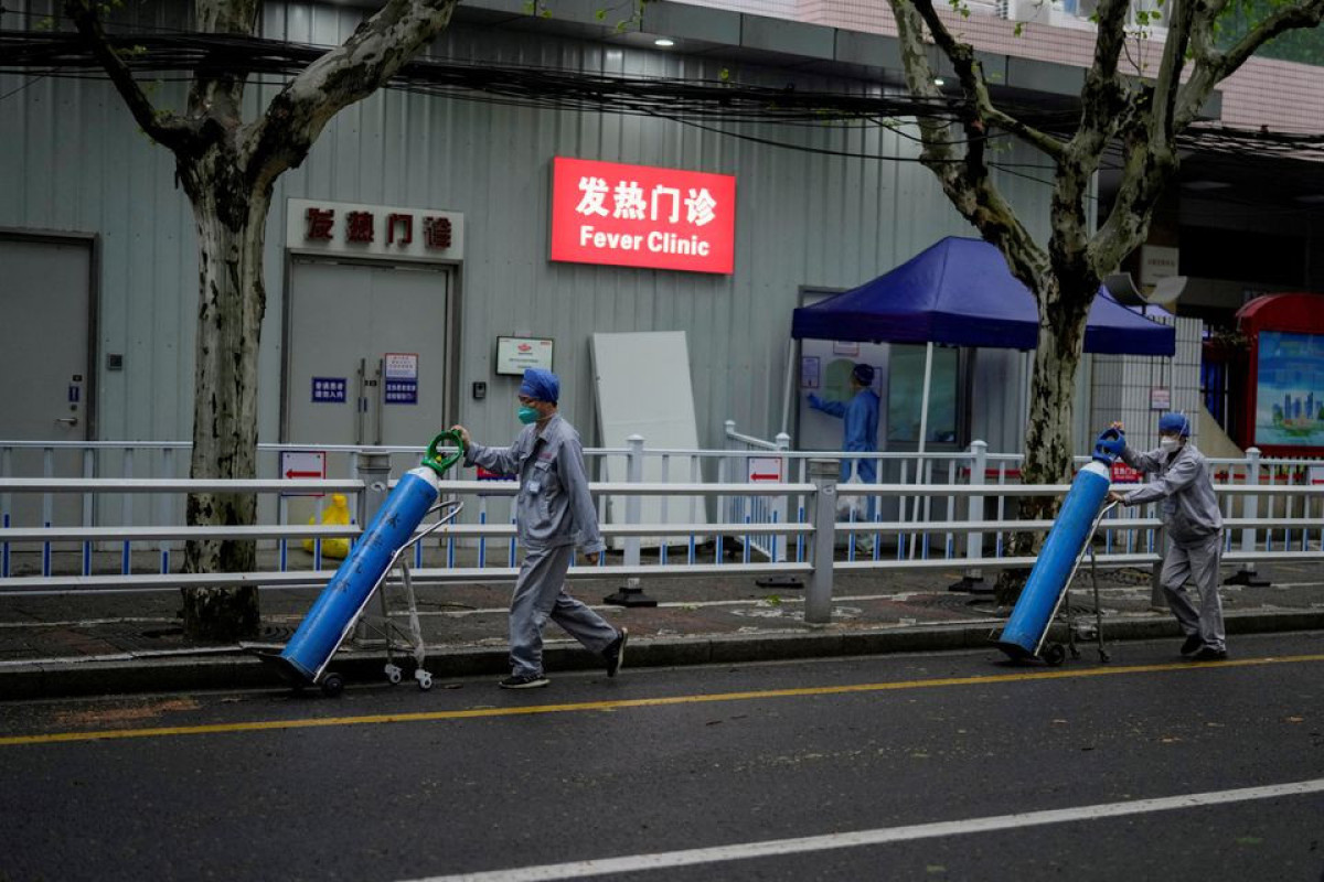 China fights COVID flare-ups on multiple fronts including Shanghai