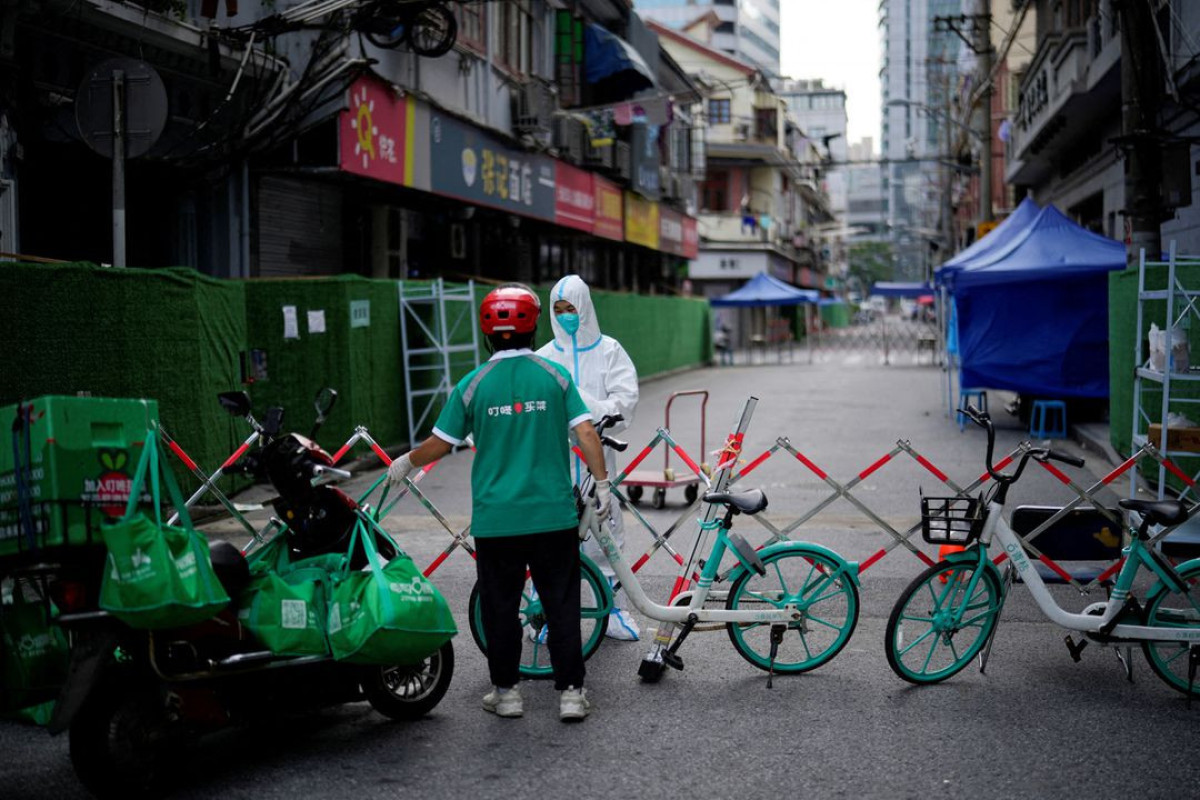 Shanghai plans more COVID testing amid fresh curbs across China