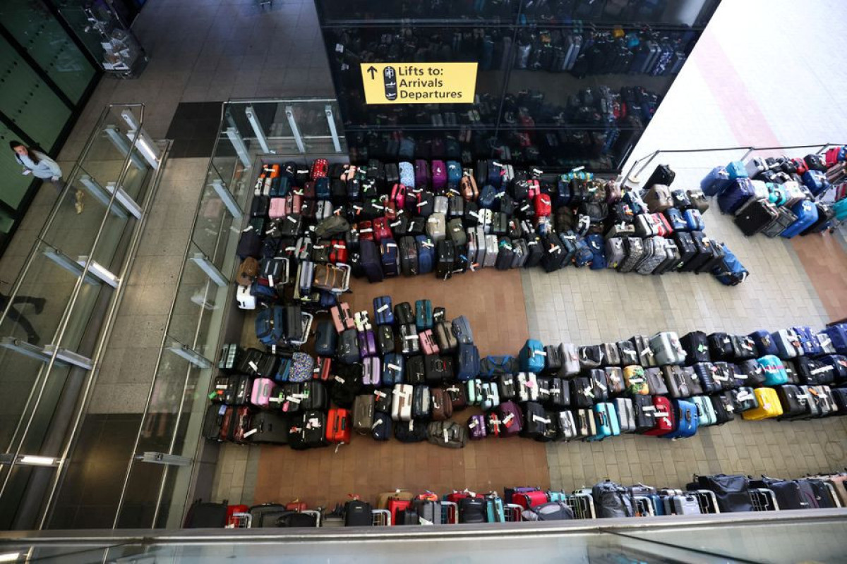London's Heathrow airport caps departing passengers at 100,000 a day