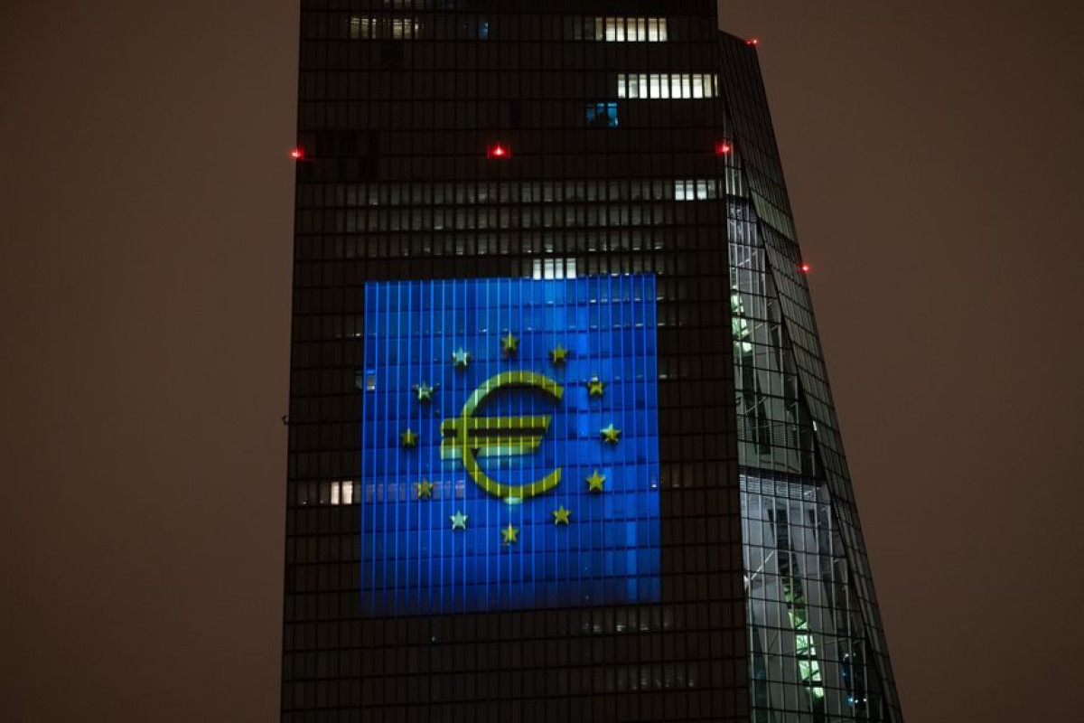 Euro slips below Dollar