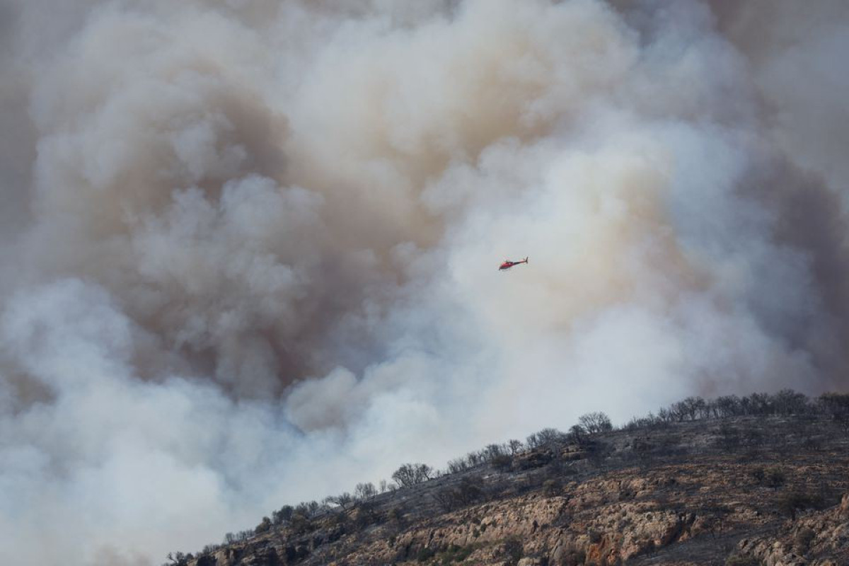Wildfires rage in France and Spain as heatwaves sear Europe