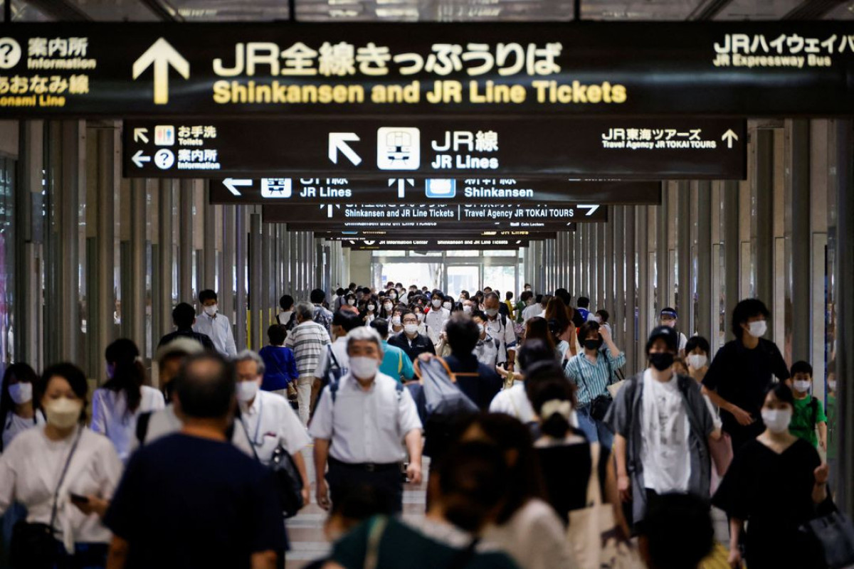 Japan looks to regions to mount COVID fight as variant spreads