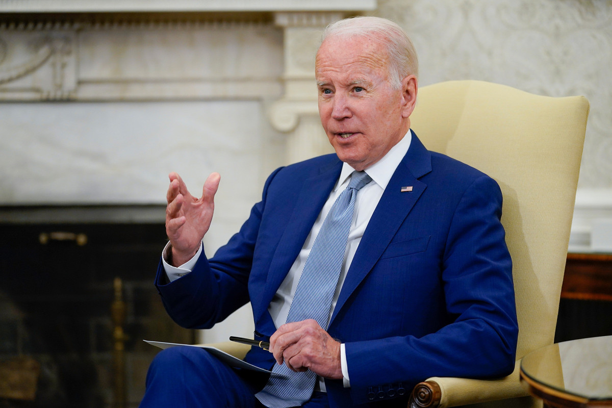 President Joe Biden speaks in the Oval Office of the White House on Tuesday, May 31