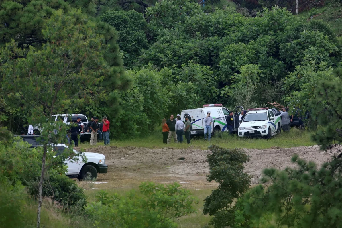 Mexican authorities search for bodies, missing tourists after priests killed in church