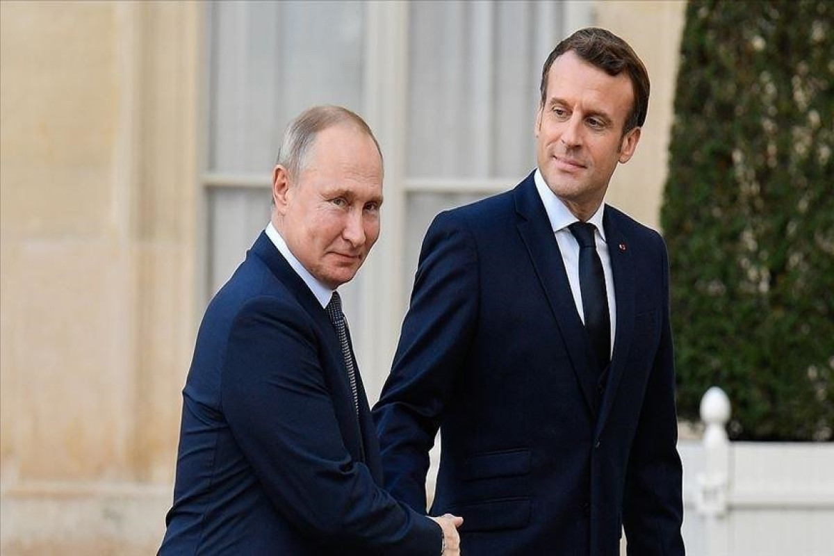 Vladimir Putin, President of Russia and Emmanuel Macron, President of France