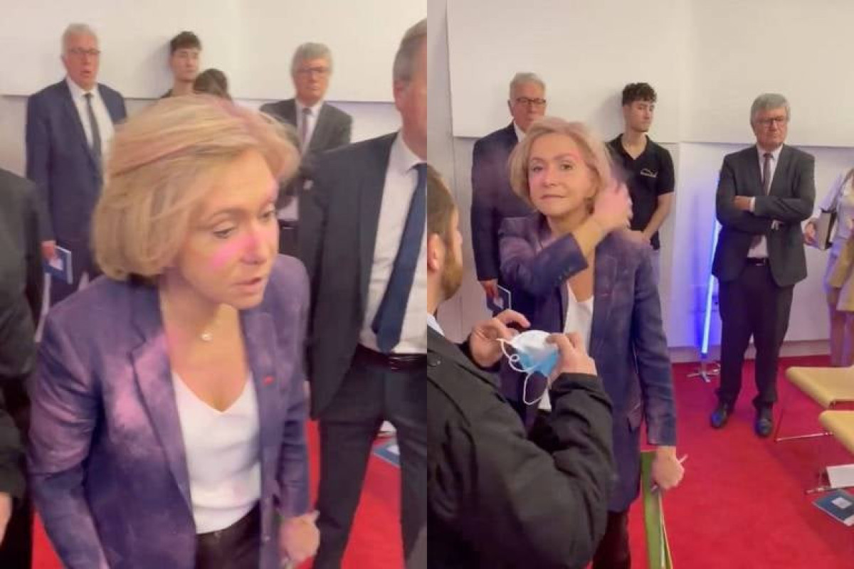 French presidential candidate sprayed with pink powder during visit to SMEs-VIDEO 